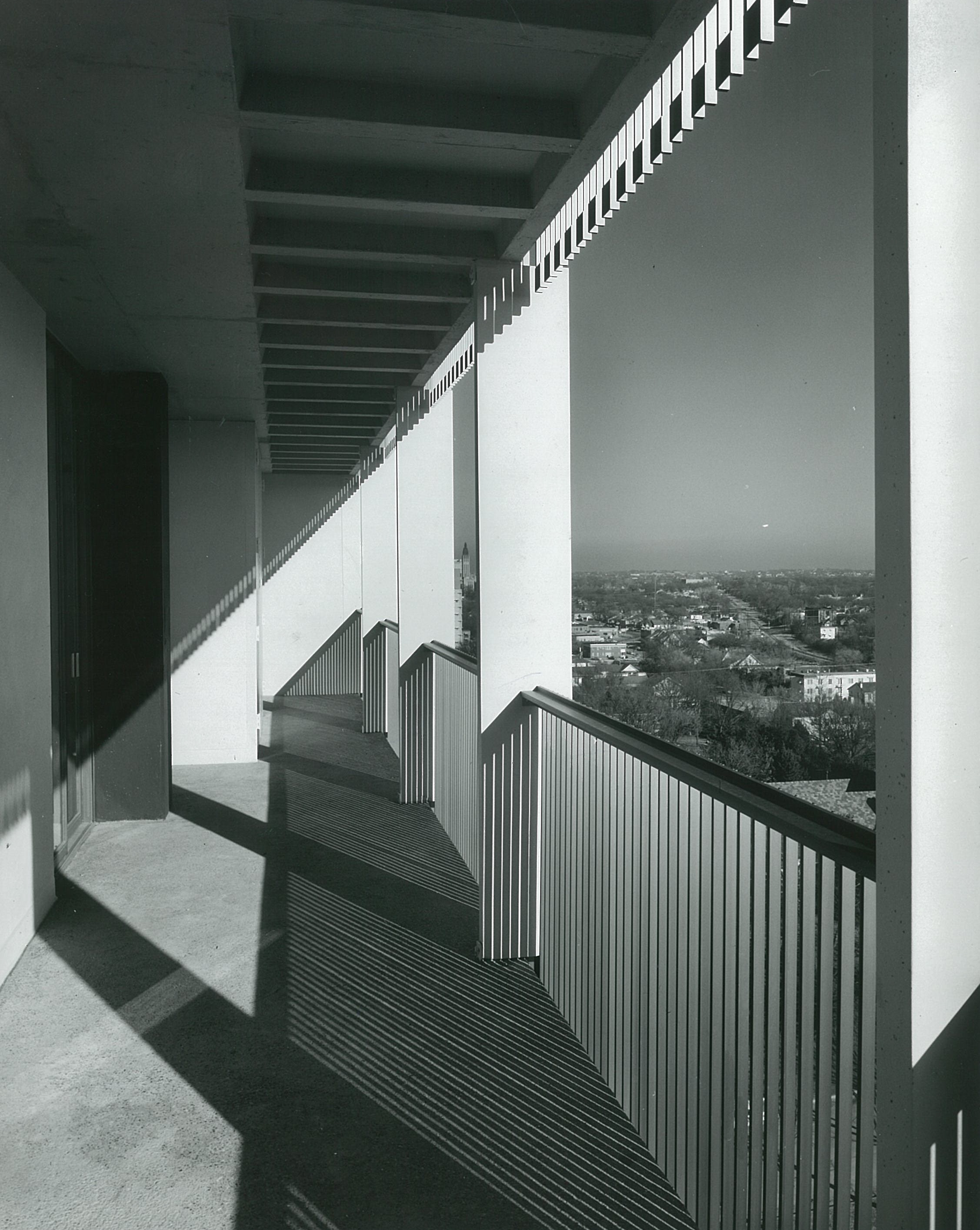 An apartment tower in the quiet of a residential neighborhood that overlooks downtown Tulsa and the Arkansas River. 