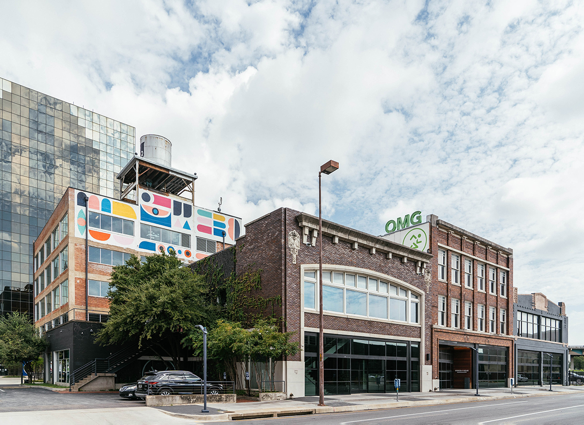Juanita is a two-story building with retail on the first floor and office on the second floor. For the facade, we removed paint to expose the beautiful brick and resealed the existing windows. The interior of the building was completely restored with new stairs, bathrooms, and life safety systems.